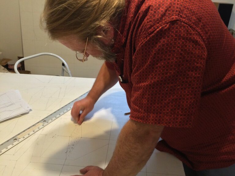 Al Honn creating his barn quilt goblet tapestry